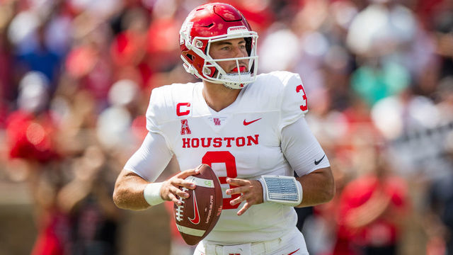 LUBBOCK, TEXAS - SEPTEMBER 10: Quarterback Clayton Tune #3 of the Houston Cougars looks to pass during the first half of the game against the Texas Tech Red Raiders at Jones AT&T Stadium on September 10, 2022 in Lubbock, Texas.