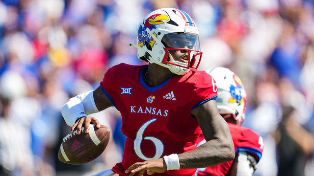 LAWRENCE, KS - SEPTEMBER 24: Jalon Daniels #6 of the Kansas Jayhawks throws a pass during the second half against the Duke Blue Devils at David Booth Kansas Memorial Stadium on September 24, 2022 in Lawrence, Kansas.