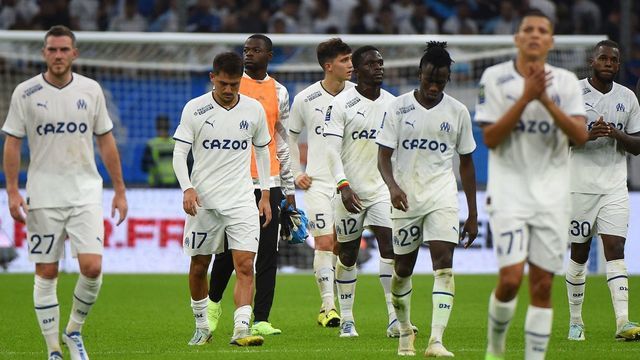 Marseille's players leave the pitch at the end of the French L1 football match between Olympique Marseille (OM) and AC Ajaccio at Stade Velodrome in Marseille, southern France on October 8, 2022.