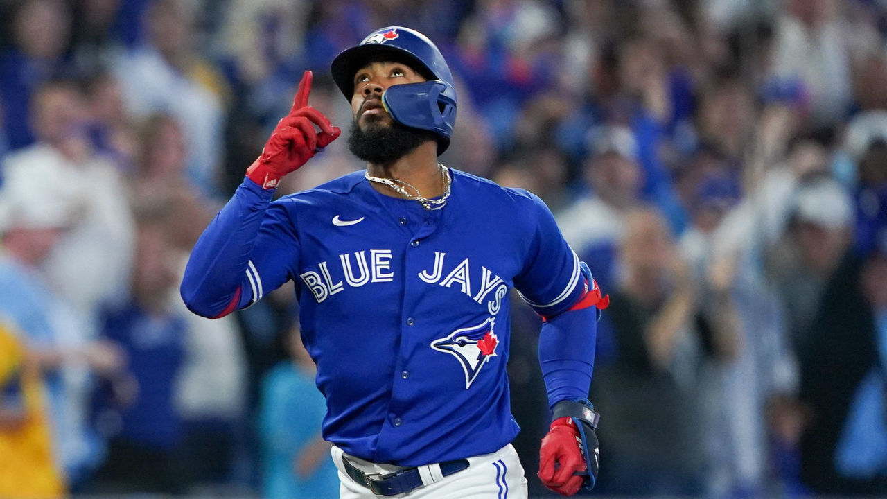 TORONTO, - OCTOBER 08: Teoscar Hernandez #37 of the Toronto Blue Jays reacts while running the bases after hitting a two-run home run in the second inning during the Wild Card Series game between the Seattle Mariners and the Toronto Blue Jays at Rogers Centre on Saturday, October 8, 2022 in Toronto, Canada.