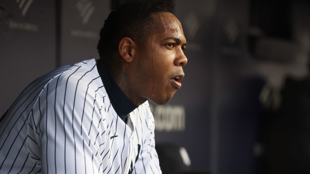 NEW YORK, NY - OCTOBER 02: Aroldis Chapman #54 of the New York Yankees looks on from the dugout in the seventh inning during the game between the Baltimore Orioles and the New York Yankees at Yankee Stadium on Sunday, October 2, 2022 in New York, New York.