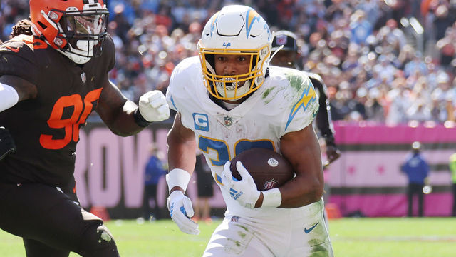 CLEVELAND, OHIO - OCTOBER 09: Austin Ekeler #30 of the Los Angeles Chargers scores a touchdown during the second quarter against the Cleveland Browns at FirstEnergy Stadium on October 09, 2022 in Cleveland, Ohio.