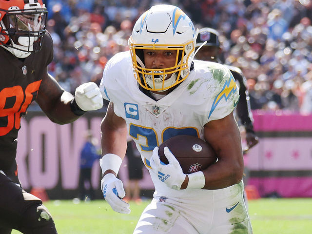 CLEVELAND, OHIO - OCTOBER 09: Austin Ekeler #30 of the Los Angeles Chargers scores a touchdown during the second quarter against the Cleveland Browns at FirstEnergy Stadium on October 09, 2022 in Cleveland, Ohio.