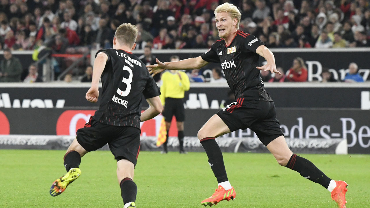 Union Berlin's German defender Paul Jaeckel (L) celebrates scoring the opening goal with his team mate Union Berlin's Norwegian midfielder Morten Thorsby during the German first division Bundesliga football match VfB Stuttgart v Union Berlin in Stuttgart, southern Germany, on October 9, 2022. - - DFL REGULATIONS PROHIBIT ANY USE OF PHOTOGRAPHS AS IMAGE SEQUENCES AND/OR QUASI-VIDEO