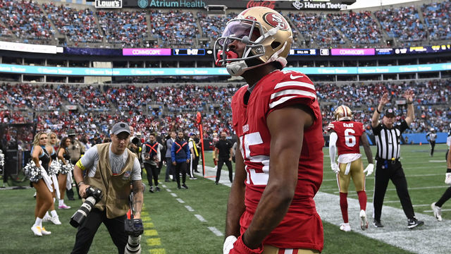CHARLOTTE, NORTH CAROLINA - OCTOBER 09: Jauan Jennings #15 of the San Francisco 49ers celebrates after a touchdown during the second half against the Carolina Panthers at Bank of America Stadium on October 09, 2022 in Charlotte, North Carolina.