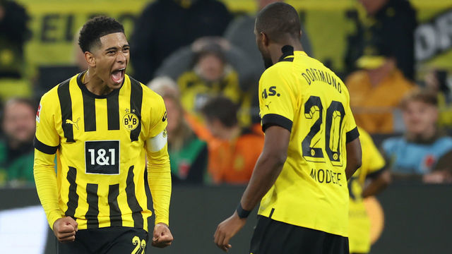 DORTMUND, GERMANY - OCTOBER 08: Anthony Modeste of Borussia Dortmund celebrates their team's second goal with teammate Jude Bellingham during the Bundesliga match between Borussia Dortmund and FC Bayern München at Signal Iduna Park on October 08, 2022 in Dortmund, Germany.