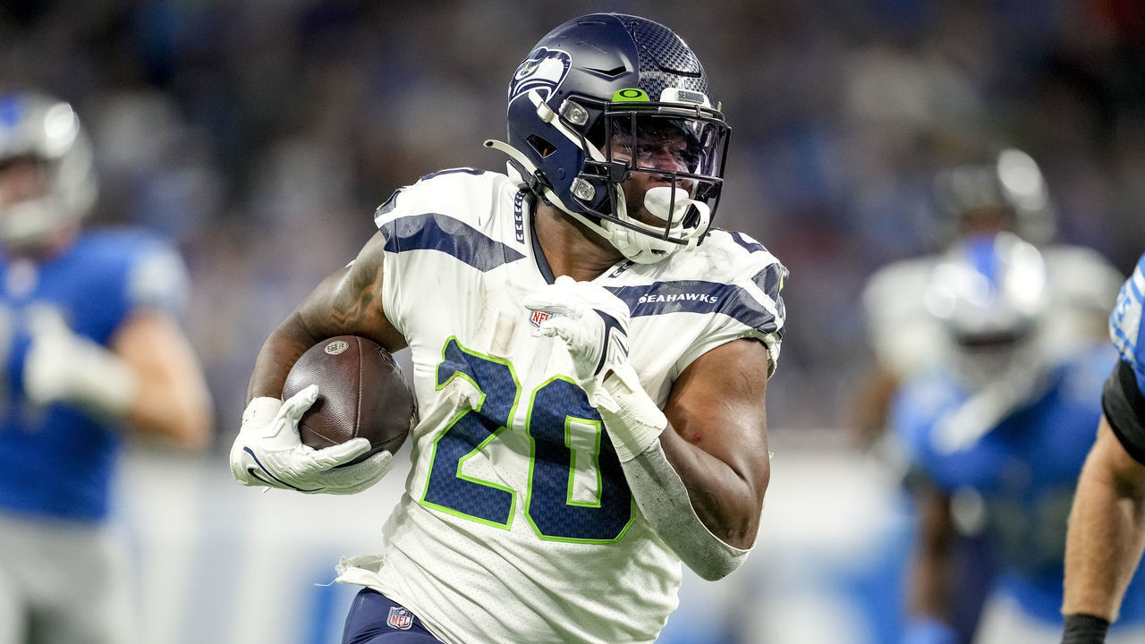 DETROIT, MICHIGAN - OCTOBER 02: Rashaad Penny #20 of the Seattle Seahawks runs the ball against the Detroit Lions at Ford Field on October 2, 2022 in Detroit, Michigan.