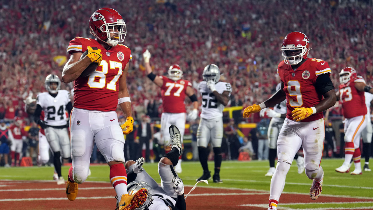KANSAS CITY, MISSOURI - OCTOBER 10: Travis Kelce #87 of the Kansas City Chiefs catches a pass in the endzone for a touchdown during the 1st half of the game against the Las Vegas Raiders at Arrowhead Stadium on October 10, 2022 in Kansas City, Missouri.