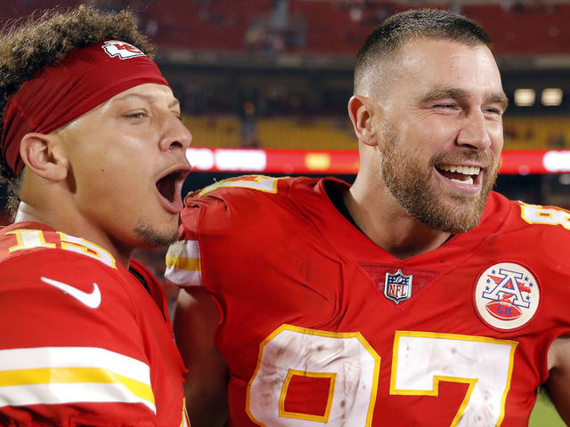 KANSAS CITY, MISSOURI - OCTOBER 10: Patrick Mahomes #15 and Travis Kelce #87 of the Kansas City Chiefs celebrate after the Chiefs defeated the Las Vegas Raiders 30-29 to win the game at Arrowhead Stadium on October 10, 2022 in Kansas City, Missouri.