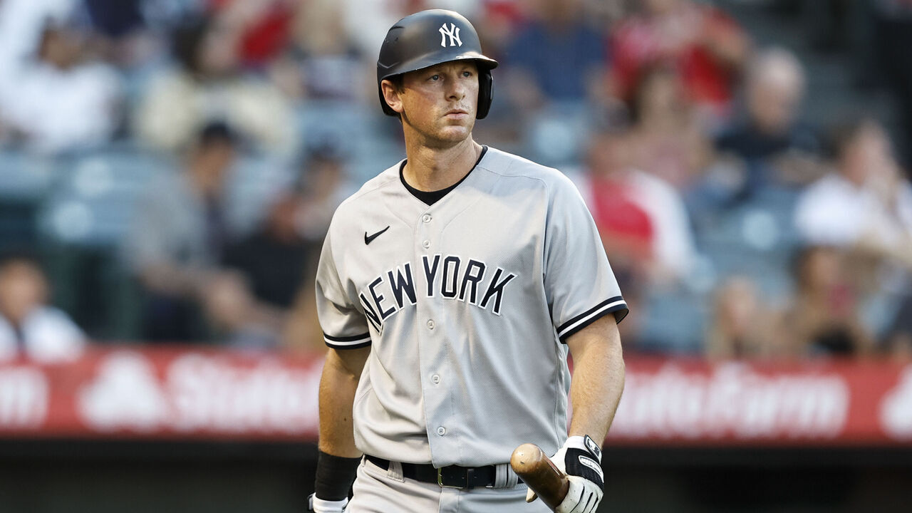 ANAHEIM, CALIFORNIA - AUGUST 29: DJ LeMahieu #26 of the New York Yankees walks to the dugout after striking out during the first inning of a game between the Los Angeles Angels and the New York Yankees at Angel Stadium of Anaheim on August 29, 2022 in Anaheim, California.