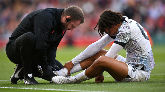 LONDON, ENGLAND - OCTOBER 09: Trent Alexander-Arnold of Liverpool receives treatment during the Premier League match between Arsenal FC and Liverpool FC at Emirates Stadium on October 09, 2022 in London, England.