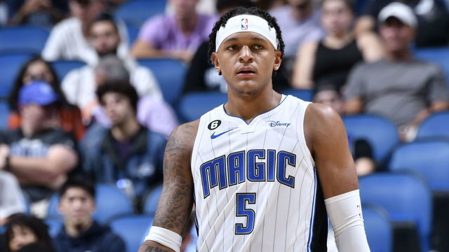 ORLANDO, FL - OCTOBER 11: Paolo Banchero #5 of the Orlando Magic looks on during the game against the Memphis Grizzlies on October 11, 2022 at Amway Center in Orlando, Florida. Mandatory Copyright Notice: Copyright 2022 NBAE