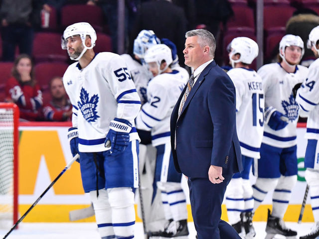 MONTREAL, CANADA - OCTOBER 03: Head coach of the Toronto Maple Leafs, Sheldon Keefe, walks across the ice after a victory against the Montreal Canadiens in a preseason game at Centre Bell on October 3, 2022 in Montreal, Quebec, Canada. The Toronto Maple Leafs defeated the Montreal Canadiens 5-1.