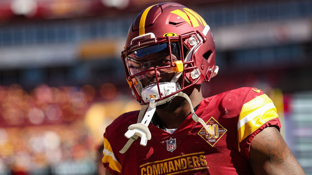 LANDOVER, MD - OCTOBER 09: Brian Robinson #8 of the Washington Commanders looks on against the Tennessee Titans during the first half of the game at FedExField on October 9, 2022 in Landover, Maryland.