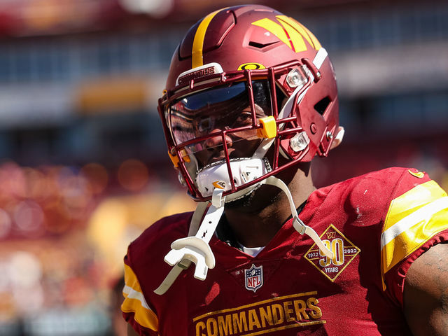 Brian Robinson Jr. #8 of the Washington Commanders looks on as he