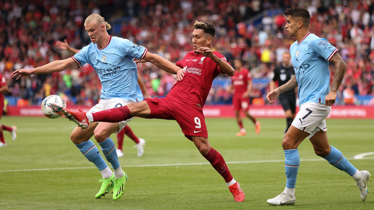 LEICESTER, ENGLAND - JULY 30: Erling Haaland of Manchester City in action with Roberto Firmino of Liverpool during the The FA Community Shield at The King Power Stadium on July 30, 2022 in Leicester, England.