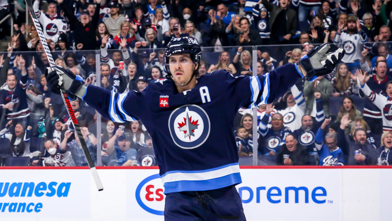 WINNIPEG, CANADA - OCTOBER 14: Mark Scheifele #55 of the Winnipeg Jets celebrates after scoring a first period goal against the New York Rangers at the Canada Life Centre on October 14, 2022 in Winnipeg, Manitoba, Canada.