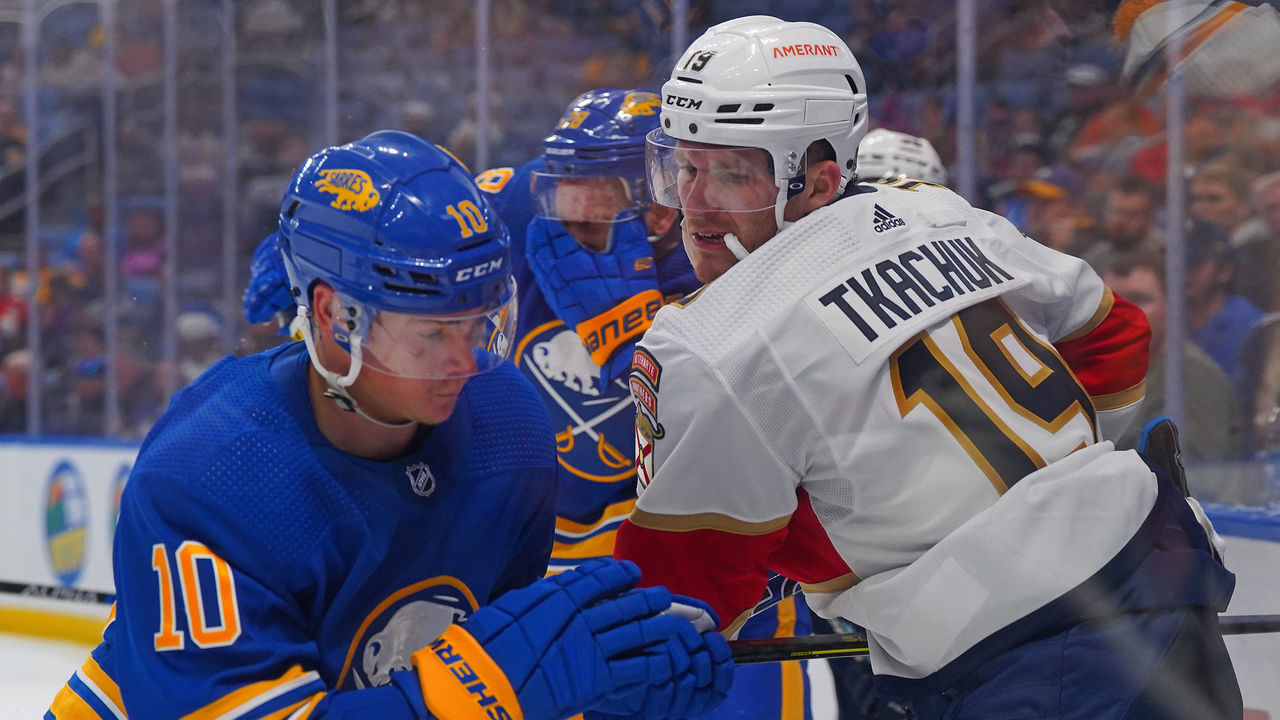 BUFFALO, NY - OCTOBER 15: Henri Jokiharju #10 of the Buffalo Sabres and Matthew Tkachuk #19 of the Florida Panthers vie for position during the third period at KeyBank Center on October 15, 2022 in Buffalo, New York.