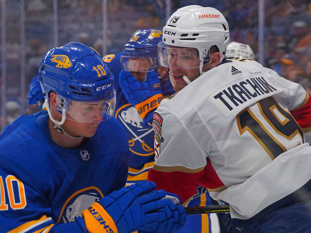 BUFFALO, NY - OCTOBER 15: Henri Jokiharju #10 of the Buffalo Sabres and Matthew Tkachuk #19 of the Florida Panthers vie for position during the third period at KeyBank Center on October 15, 2022 in Buffalo, New York.
