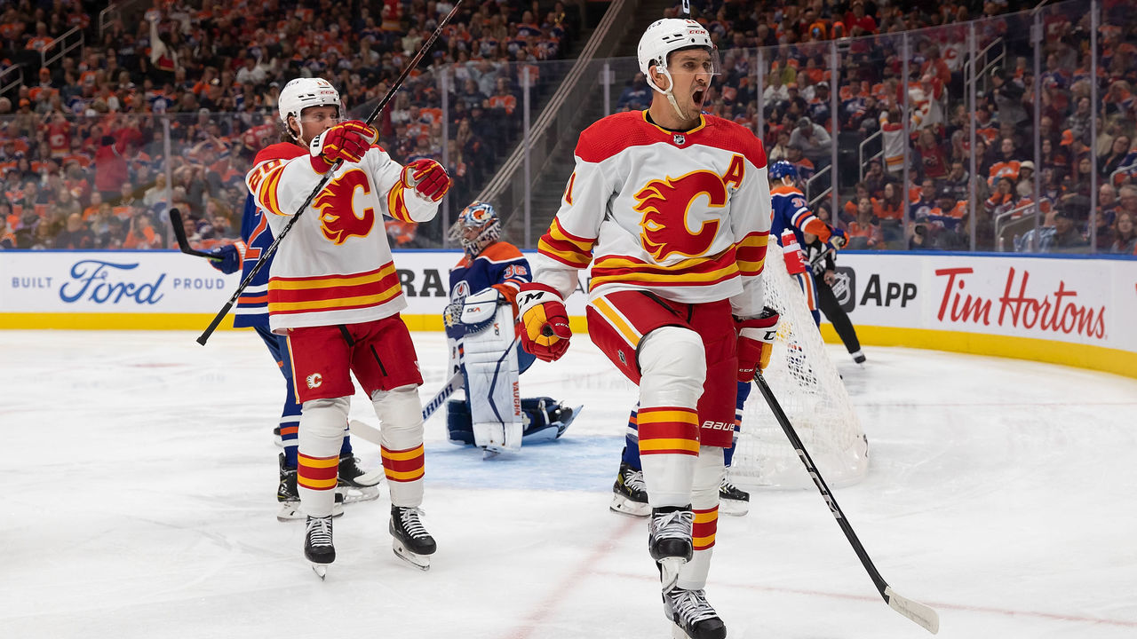 EDMONTON, AB - OCTOBER 15: Mikael Backlund #11 of the Calgary Flames celebrates a goal against the Edmonton Oilers during the first period at Rogers Place on October 15, 2022 in Edmonton, Canada.