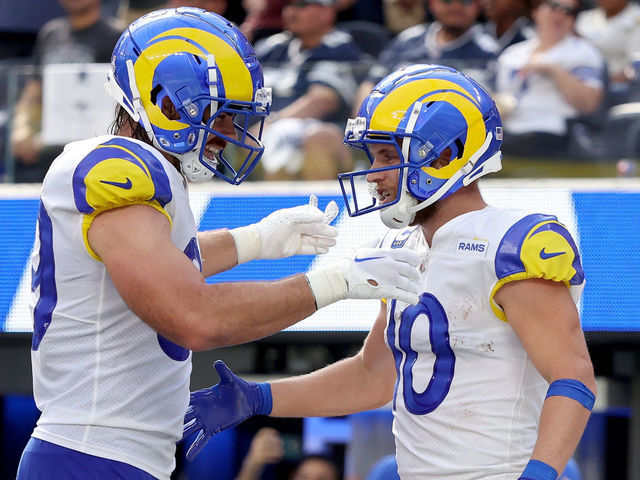 INGLEWOOD, CALIFORNIA - OCTOBER 09: Tyler Higbee #89 of the Los Angeles Rams congratulates Cooper Kupp #10 of the Los Angeles Rams after a touchdown against the Dallas Cowboys during the second quarter at SoFi Stadium on October 09, 2022 in Inglewood, California.