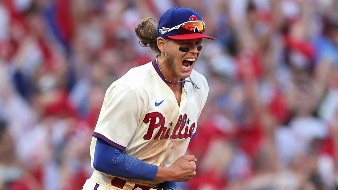PHILADELPHIA, PENNSYLVANIA - OCTOBER 15: Alec Bohm #28 of the Philadelphia Phillies celebrates after defeating the Atlanta Braves in game four of the National League Division Series at Citizens Bank Park on October 15, 2022 in Philadelphia, Pennsylvania.