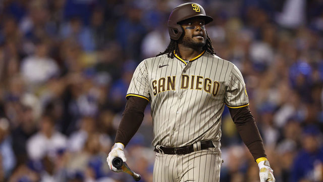 LOS ANGELES, CALIFORNIA - OCTOBER 11: Josh Bell #24 of the San Diego Padres reacts after striking out in the sixth inning in game one of the National League Division Series against the Los Angeles Dodgers at Dodger Stadium on October 11, 2022 in Los Angeles, California.