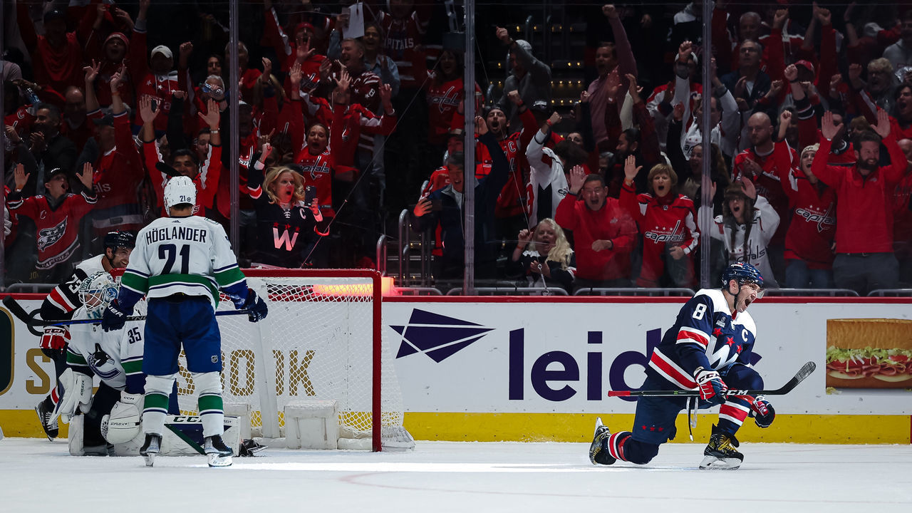 WASHINGTON, DC - OCTOBER 17: Alex Ovechkin #8 of the Washington Capitals celebrates after scoring a goal against Thatcher Demko #35 of the Vancouver Canucks during the third period of the game at Capital One Arena on October 17, 2022 in Washington, DC.