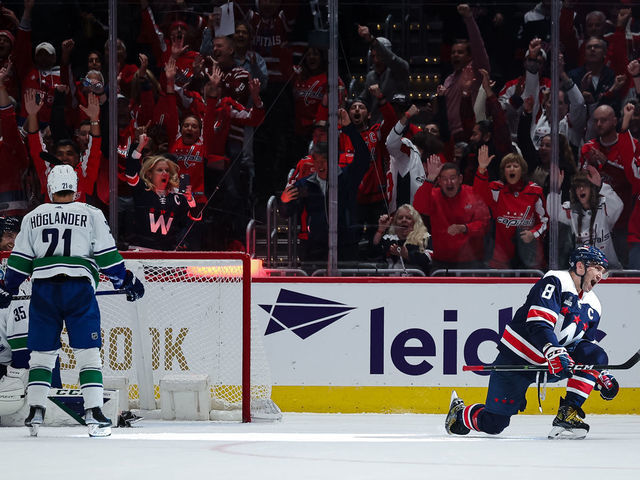 WASHINGTON, DC - OCTOBER 17: Alex Ovechkin #8 of the Washington Capitals celebrates after scoring a goal against Thatcher Demko #35 of the Vancouver Canucks during the third period of the game at Capital One Arena on October 17, 2022 in Washington, DC.