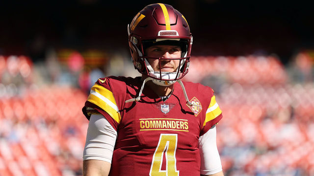 LANDOVER, MARYLAND - OCTOBER 09: Taylor Heinicke #4 of the Washington Commanders warms up against the Tennessee Titans at FedExField on October 09, 2022 in Landover, Maryland.