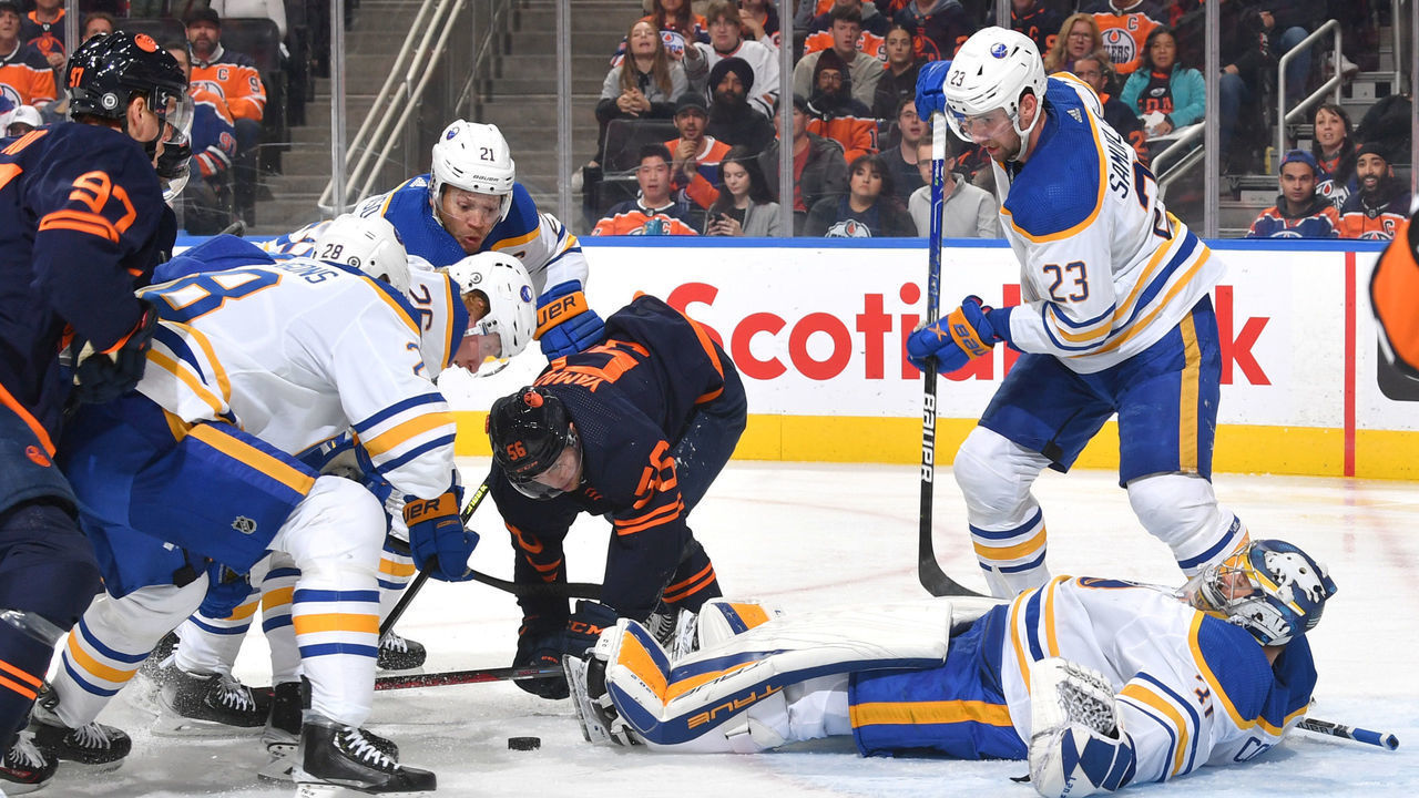 EDMONTON, CANADA - OCTOBER 18: Eric Comrie #31 of the Buffalo Sabres makes a save during the game against the Edmonton Oilers on October 18, 2022 at Rogers Place in Edmonton, Alberta, Canada.