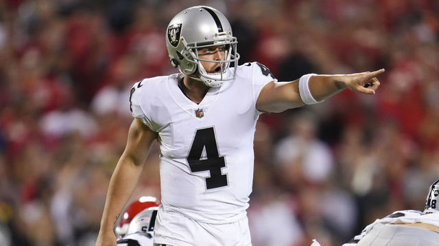 KANSAS CITY, MO - OCTOBER 10: Derek Carr #4 of the Las Vegas Raiders points down the line of scrimmage against the Kansas City Chiefs at GEHA Field at Arrowhead Stadium on October 10, 2022 in Kansas City, Missouri.