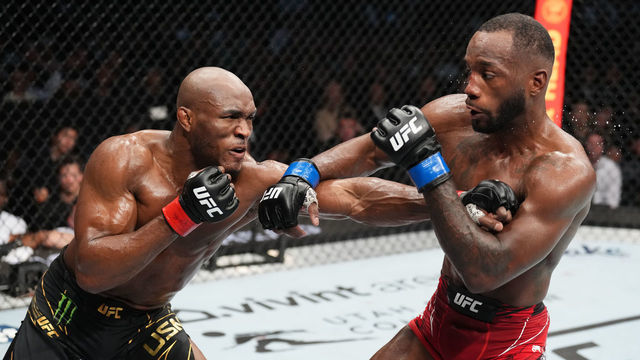 SALT LAKE CITY, UTAH - AUGUST 20: (L-R) Kamaru Usman of Nigeria punches Leon Edwards of Jamaica in the UFC welterweight championship fight during the UFC 278 event at Vivint Arena on August 20, 2022 in Salt Lake City, Utah.