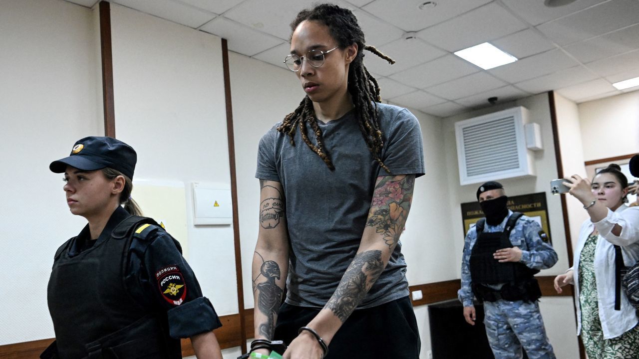 TOPSHOT - US Women National Basketball Association's (WNBA) basketball player Brittney Griner, who was detained at Moscow's Sheremetyevo airport and later charged with illegal possession of cannabis, leaves the courtroom before the court's final decision in Khimki outside Moscow, on August 4, 2022. - Russian prosecutors requested that US basketball star Brittney Griner be sentenced to nine and a half years in prison on drug smuggling charges. Her hearing comes with tensions soaring between Moscow and Washington over Russia's military intervention in Ukraine that has sparked international condemnation and a litany of Western sanctions.