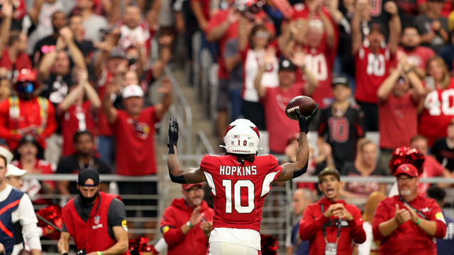 GLENDALE, ARIZONA - OCTOBER 24: DeAndre Hopkins #10 of the Arizona Cardinals celebrates after scoring a touchdown in the second quarter against the Houston Texans in the game at State Farm Stadium on October 24, 2021 in Glendale, Arizona.