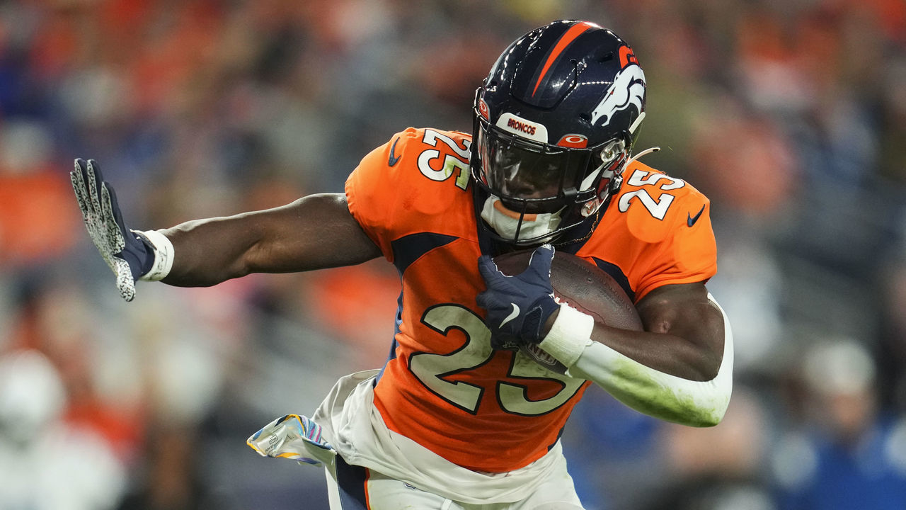 DENVER, CO - OCTOBER 06: Melvin Gordon III #25 of the Denver Broncos runs the ball against the Indianapolis Colts at Empower Field at Mile High on October 6, 2022 in Denver, Texas.
