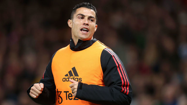 MANCHESTER, ENGLAND - OCTOBER 19: Cristiano Ronaldo of Manchester United warms up on the sidelines during the Premier League match between Manchester United and Tottenham Hotspur at Old Trafford on October 19, 2022 in Manchester, England.