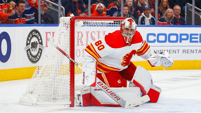 EDMONTON, AB - OCTOBER 15: Calgary Flames Goalie Dan Vladar (80) in game action makes an RVH save in the first period during the Edmonton Oilers game versus the Calgary Flames on October 15, 2022 at Rogers Place in Edmonton, AB.