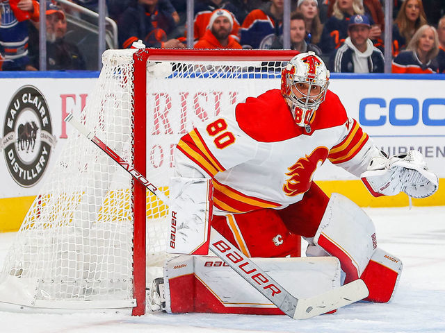 EDMONTON, AB - OCTOBER 15: Calgary Flames Goalie Dan Vladar (80) in game action makes an RVH save in the first period during the Edmonton Oilers game versus the Calgary Flames on October 15, 2022 at Rogers Place in Edmonton, AB.