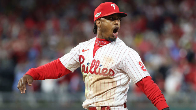 PHILADELPHIA, PENNSYLVANIA - OCTOBER 21: Jean Segura #2 of the Philadelphia Phillies celebrates with Nick Castellanos #8 after making a diving stop and throwing out Ha-Seong Kim #7 of the San Diego Padres (not pictured) at first base during the seventh inning in game three of the National League Championship Series at Citizens Bank Park on October 21, 2022 in Philadelphia, Pennsylvania.