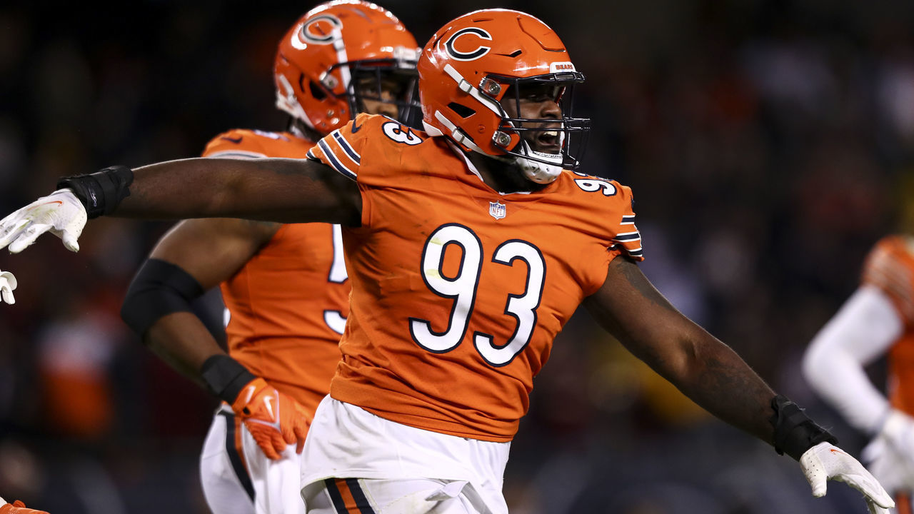 CHICAGO, IL - OCTOBER 13: Justin Jones #93 of the Chicago Bears celebrates after a missed field goal during the fourth quarter of an NFL football game against the Washington Commanders at Soldier Field on October 13, 2022 in Chicago, Illinois.