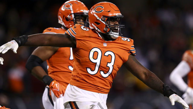 CHICAGO, IL - OCTOBER 13: Justin Jones #93 of the Chicago Bears celebrates after a missed field goal during the fourth quarter of an NFL football game against the Washington Commanders at Soldier Field on October 13, 2022 in Chicago, Illinois.