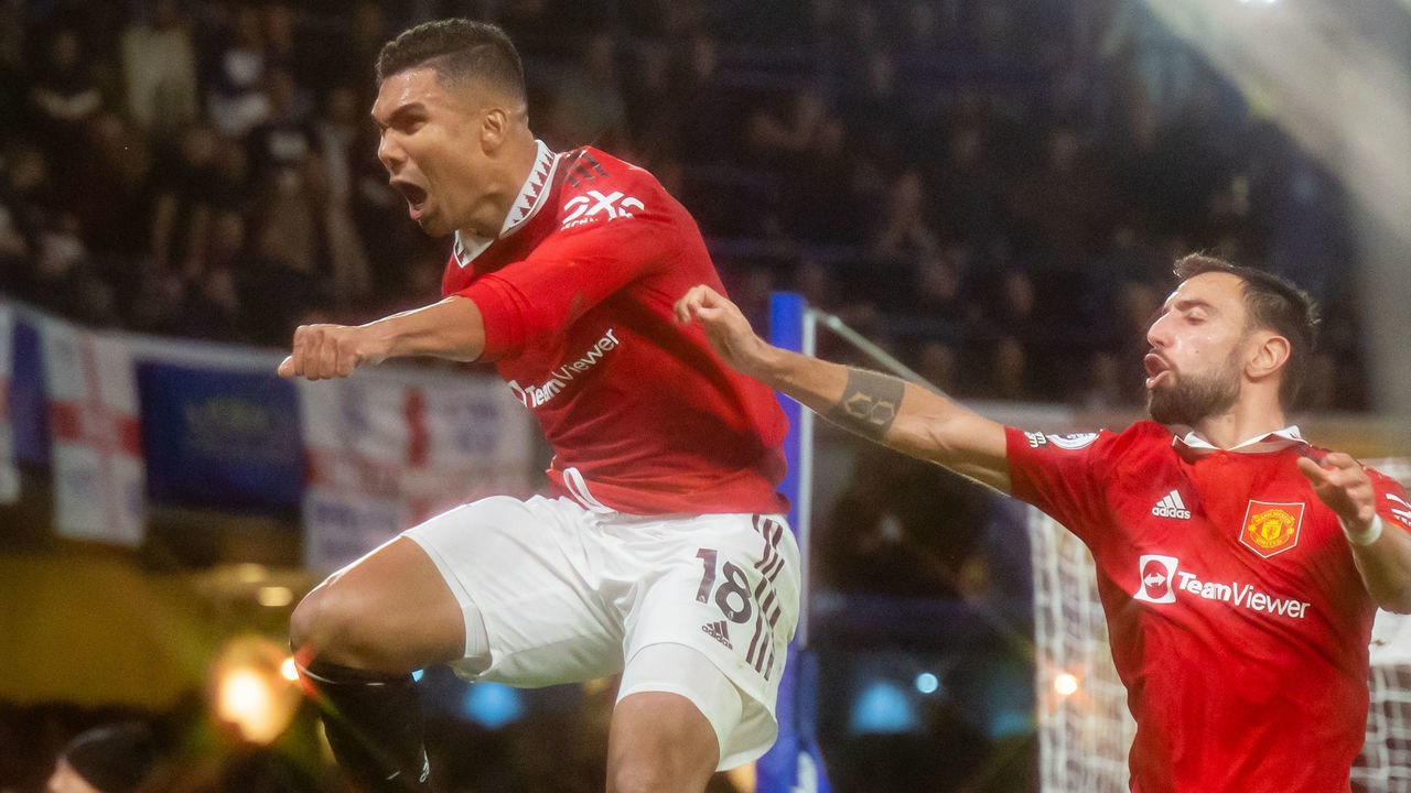 LONDON, ENGLAND - OCTOBER 22: Casemiro of Manchester United celebrates scoring a goal to make the score 1-1 with Bruno Fernandes during the Premier League match between Chelsea FC and Manchester United at Stamford Bridge on October 23, 2022 in London, United Kingdom.