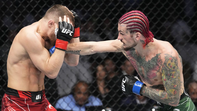 ABU DHABI, UNITED ARAB EMIRATES - OCTOBER 22: (R-L) Sean O'Malley punches Petr Yan of Russia in a bantamweight fight during the UFC 280 event at Etihad Arena on October 22, 2022 in Abu Dhabi, United Arab Emirates.
