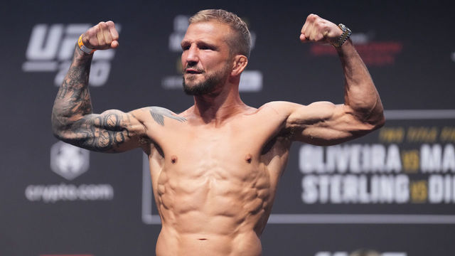 ABU DHABI, UNITED ARAB EMIRATES - OCTOBER 21: TJ Dillashaw poses on the scale during the UFC 280 ceremonial weigh-in at Etihad Arena on October 21, 2022 in Abu Dhabi, United Arab Emirates.