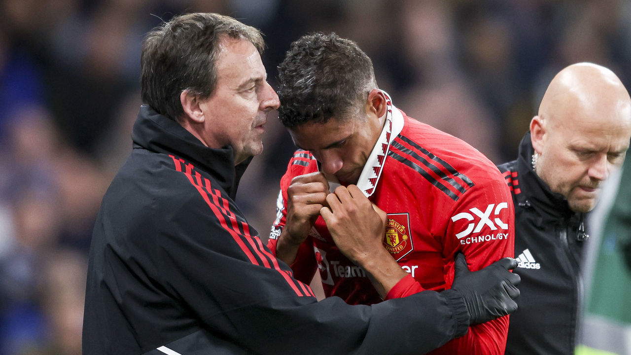 LONDON, ENGLAND - OCTOBER 22: Raphaël Varane of Manchester United is taken off and replaced following an injury during the Premier League match between Chelsea FC and Manchester United at Stamford Bridge on October 22, 2022 in London, England.