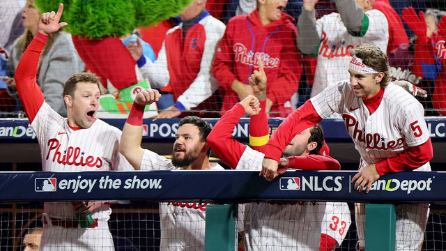 PHILADELPHIA, PENNSYLVANIA - OCTOBER 22: The Philadelphia Phillies dugout celebrates a solo home run by J.T. Realmuto #10 (not pictured during the seventh inning against the San Diego Padres in game four of the National League Championship Series at Citizens Bank Park on October 22, 2022 in Philadelphia, Pennsylvania.