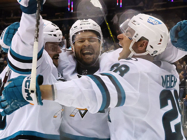 NEW YORK, NEW YORK - OCTOBER 20: (L-R) Erik Karlsson #65, Tomas Hertl #48 and Timo Meier #28 of the San Jose Sharks celebrate Karlsson's overtime goal against the New York Rangers at Madison Square Garden on October 20, 2022 in New York City. The Sharks won 3-2 in overtime.