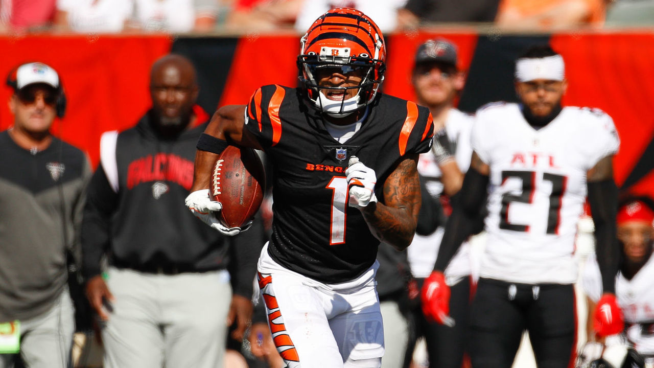 CINCINNATI, OH - OCTOBER 23: Cincinnati Bengals wide receiver Ja'Marr Chase (1) carries the ball for a touchdown during the game against the Atlanta Falcons and the Cincinnati Bengals on October 23, 2022, at Paycor Stadium in Cincinnati, OH.