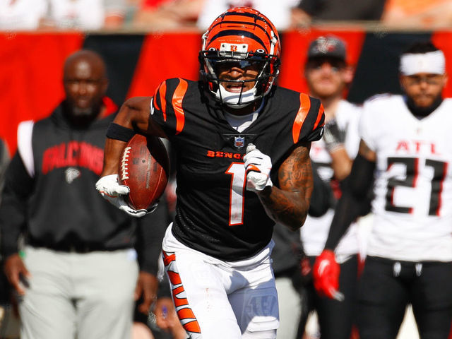CINCINNATI, OH - OCTOBER 23: Cincinnati Bengals wide receiver Ja'Marr Chase (1) carries the ball for a touchdown during the game against the Atlanta Falcons and the Cincinnati Bengals on October 23, 2022, at Paycor Stadium in Cincinnati, OH.